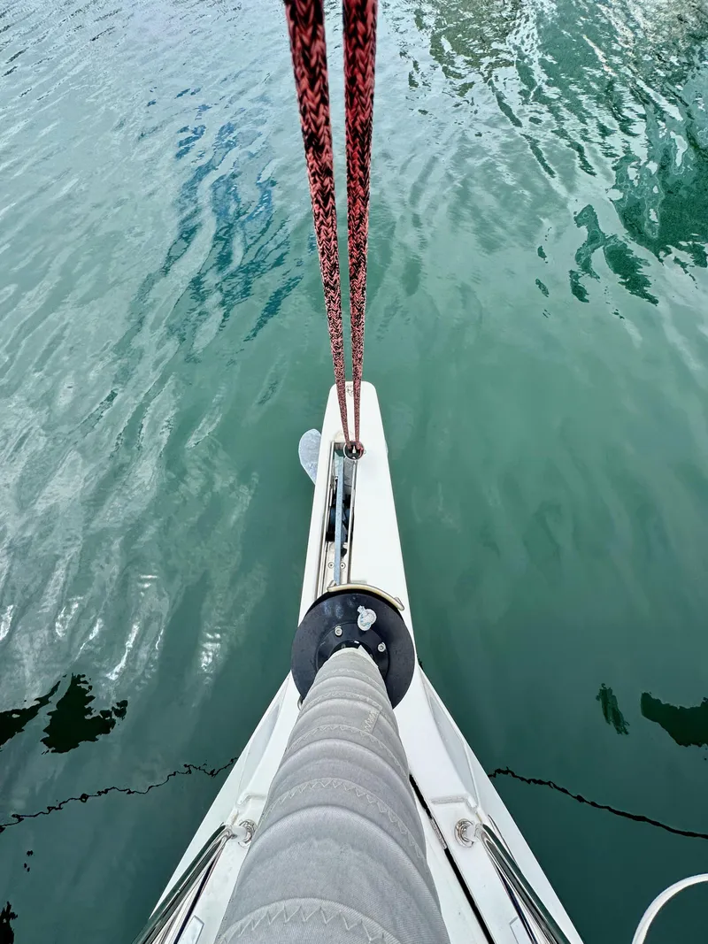 Slide: The Image of Jeanneau Sun Odyssey 490 sailboat bow over calm water, 2020 model. - 40