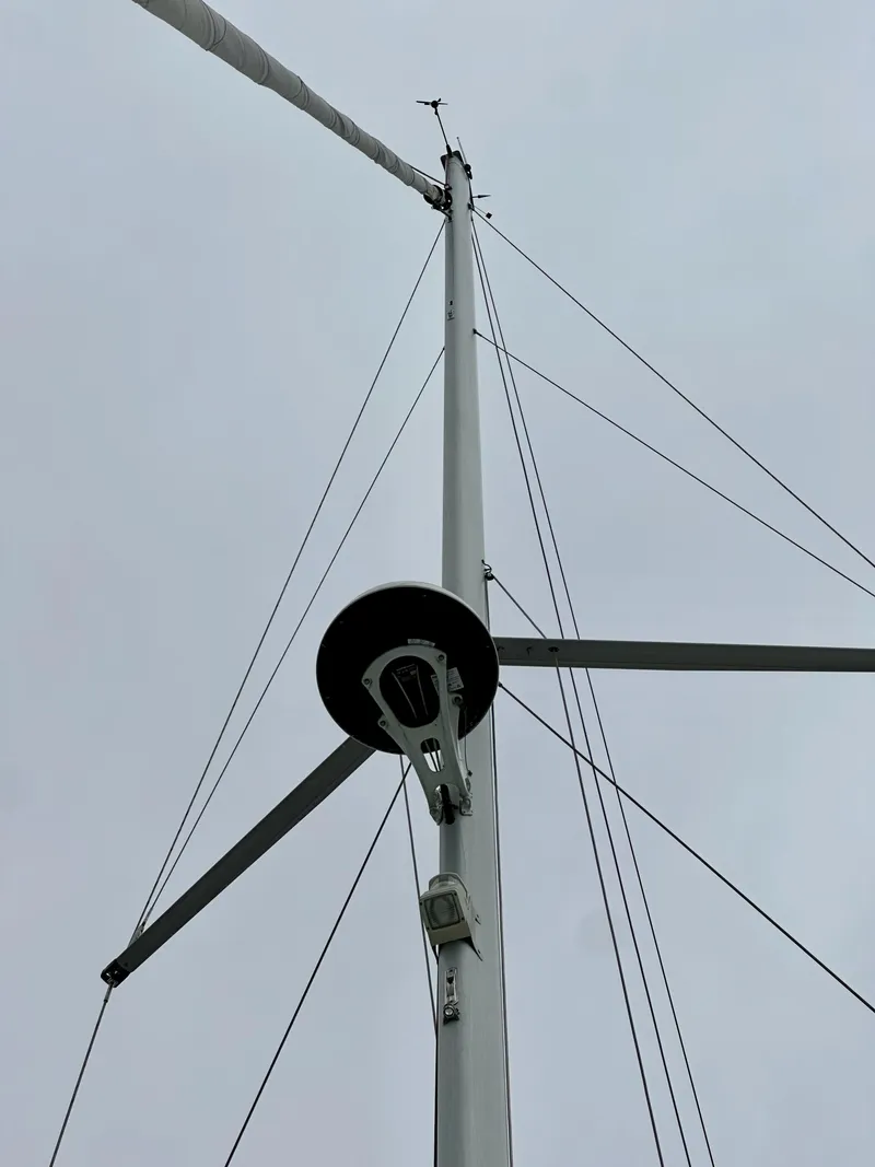 Slide: The Image of Mast of 2020 Jeanneau Sun Odyssey 490 sailboat against cloudy sky. - 42