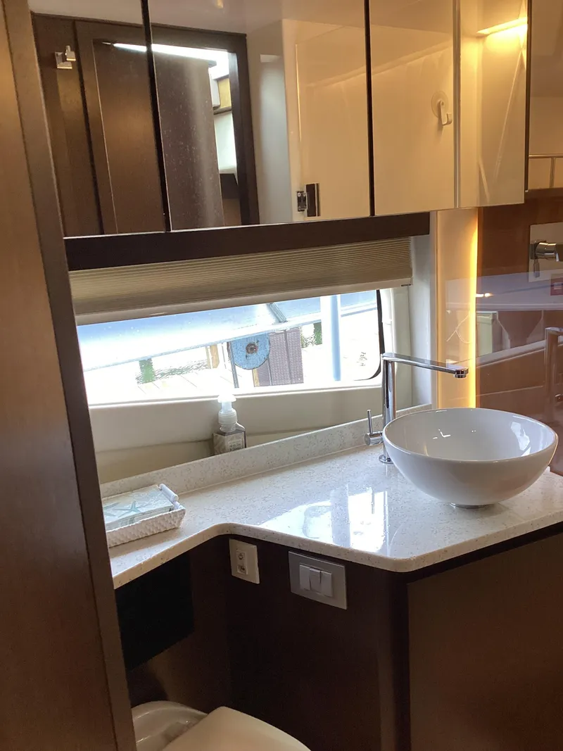 Slide: The Image of Luxurious bathroom interior of 2018 Regal 42 Fly yacht with modern fixtures. - 15