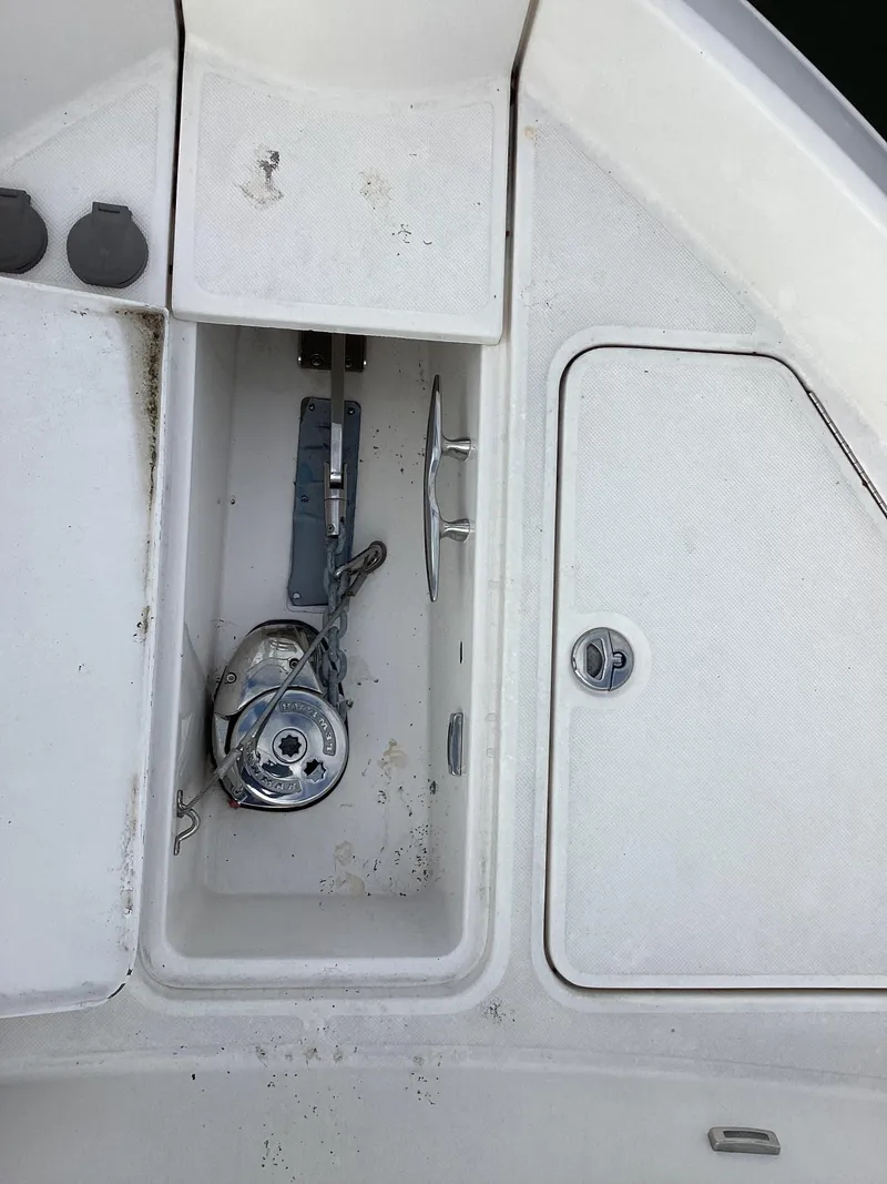 Slide: The Image of 2018 Regal 42 Fly boat deck with anchor storage compartment. - 18