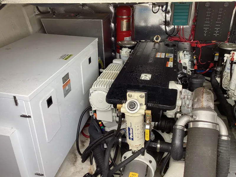 Slide: The Image of Engine room of 2018 Regal 42 Fly yacht with visible machinery and equipment. - 25