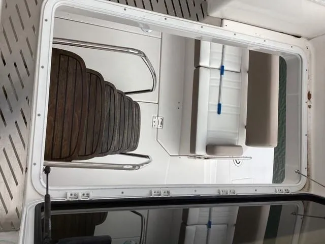 Slide: The Image of Interior view of 2018 Regal 42 Fly yacht with seating and table. - 28