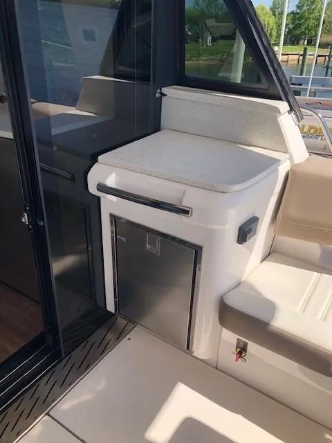 Slide: The Image of 2018 Regal 42 Fly yacht interior with seating and storage area. - 41
