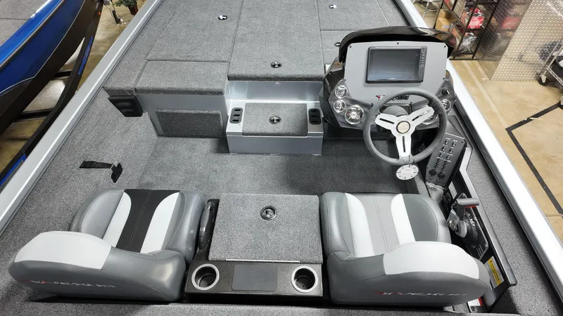 Slide: The Image of 2024 Vexus AVX1980 boat interior with dual seats and modern dashboard. - 6