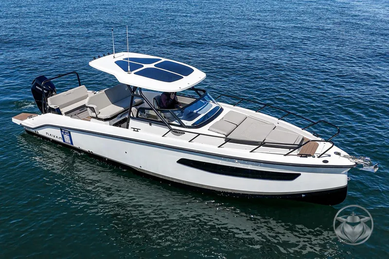 The Image of 2025 Navan S30 boat cruising on clear blue water, featuring sleek design and modern amenities. - 0