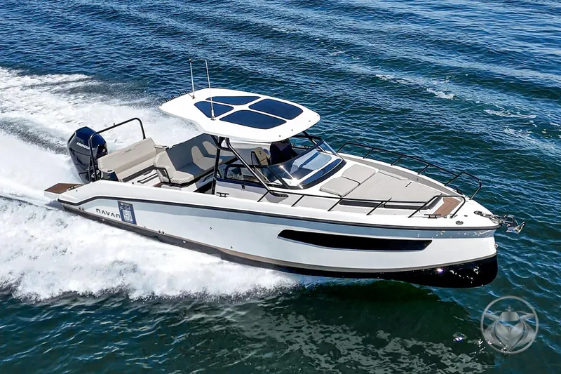 Slide: The Image of Navan S30 2025 boat cruising on open water, showcasing sleek design and modern features. - 1