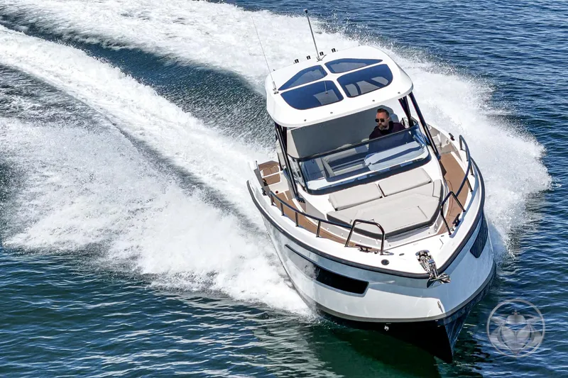 Slide: The Image of 2025 Navan S30 boat cruising swiftly on open water. - 2