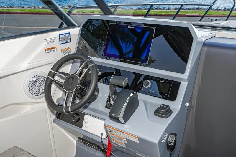 Slide: The Image of Cockpit of 2025 Navan S30 boat with modern steering and control panel. - 22