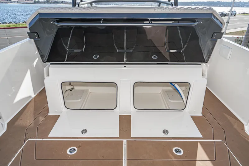 Slide: The Image of 2025 Navan S30 boat storage compartments with open hatches, showcasing spacious interior design. - 31