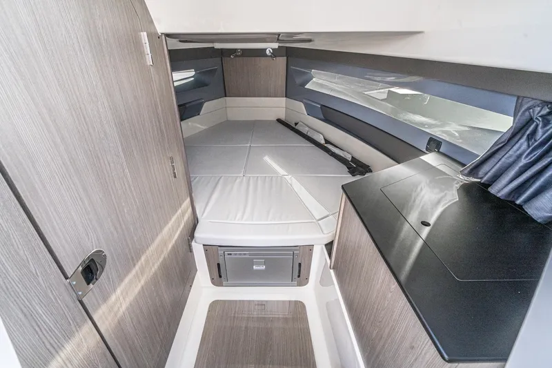 Slide: The Image of Interior of 2025 Navan S30 boat with modern cabin design and sleek furnishings. - 38