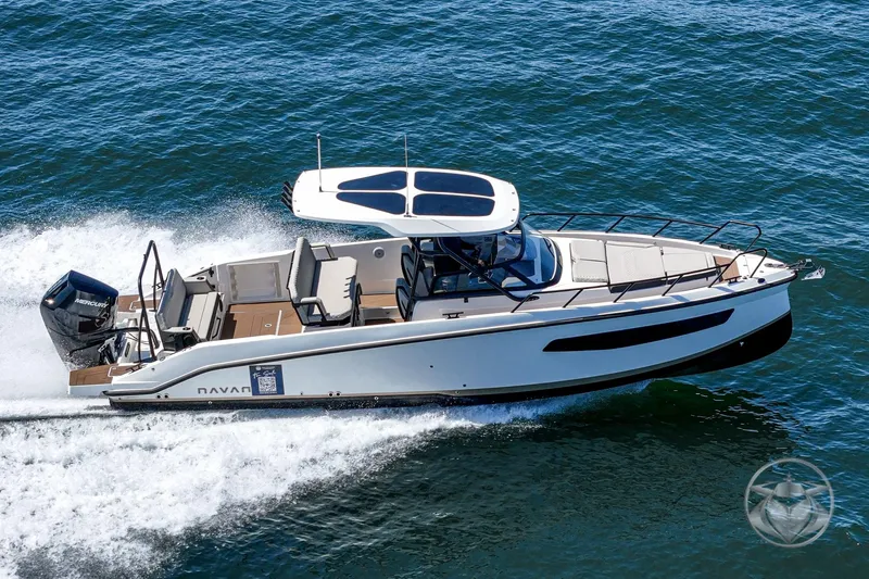 Slide: The Image of 2025 Navan S30 boat cruising on open water, showcasing sleek design and powerful engine. - 4