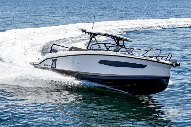 Slide: The Image of 2025 Navan S30 boat cruising on open water, showcasing sleek design and performance. - 47