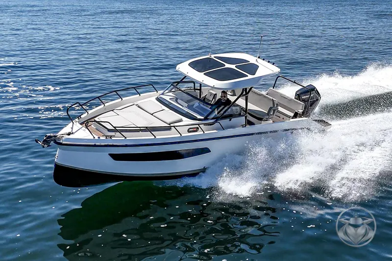 Slide: The Image of Navan S30 2025 boat cruising on open water, showcasing sleek design and performance. - 48