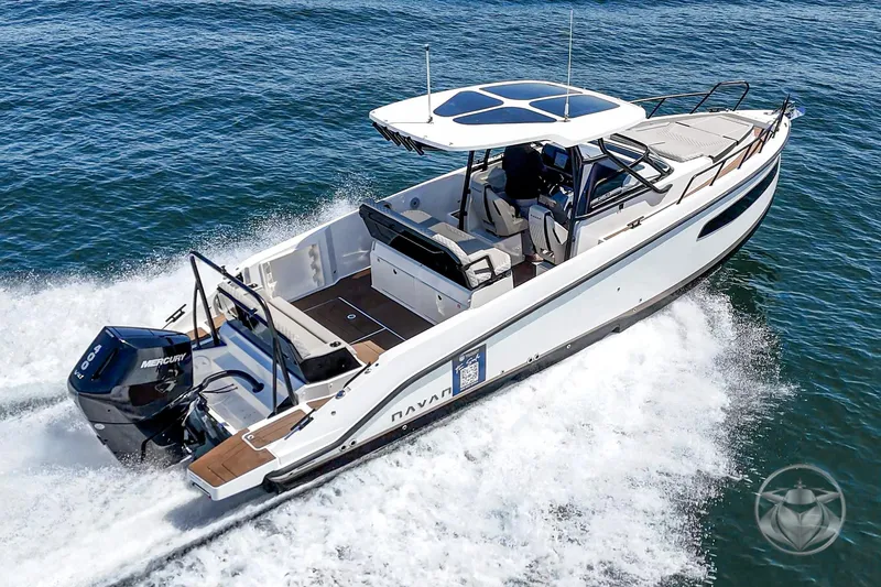 Slide: The Image of Navan S30 2025 motorboat cruising on open water, featuring sleek design and powerful engine. - 5
