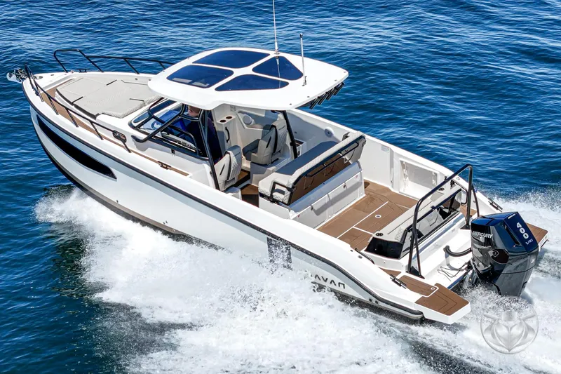 Slide: The Image of Navan S30 2025 motorboat cruising on open water, showcasing sleek design and powerful engine. - 8