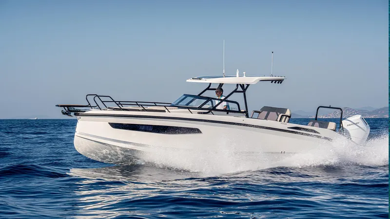 Slide: The Image of Navan S30 2025 motorboat cruising on open water, showcasing sleek design and performance. - 18