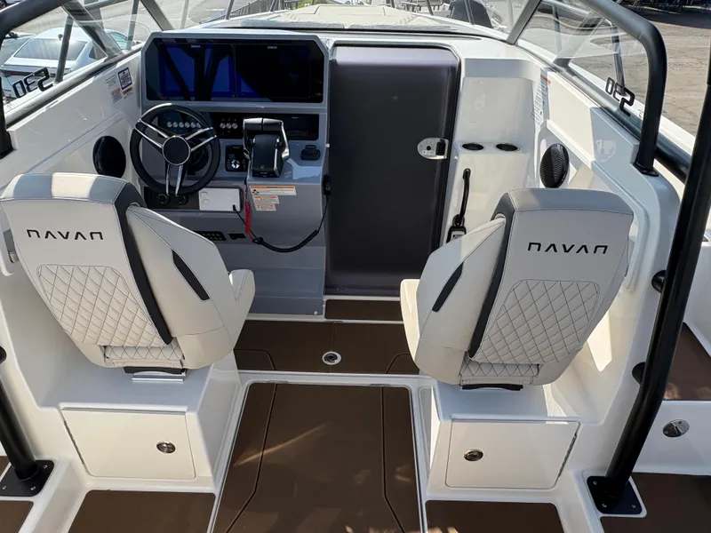 Slide: The Image of Interior of 2025 Navan S30 boat with modern dashboard and seating. - 5