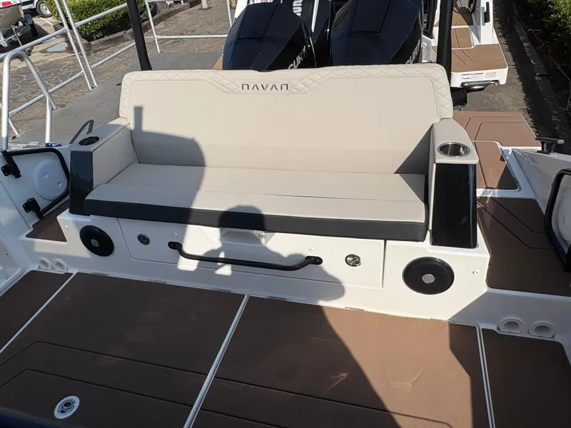 Slide: The Image of 2025 Navan S30 boat seating area with cup holders and speakers. - 6