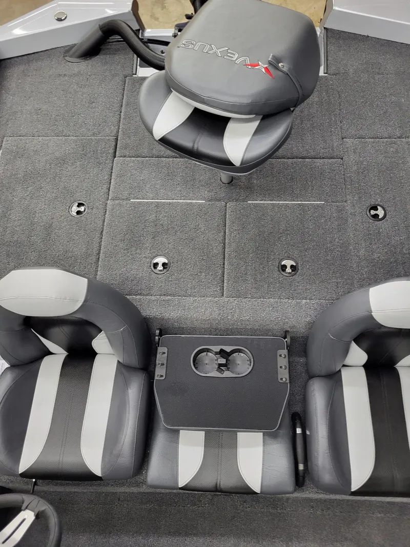 Slide: The Image of 2023 Vexus AVX1880 boat interior with gray and black seating. - 18