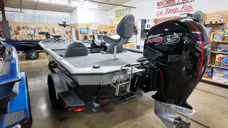 Slide: The Image of 2023 Vexus AVX1880 boat with Mercury Pro XS engine in showroom. - 6