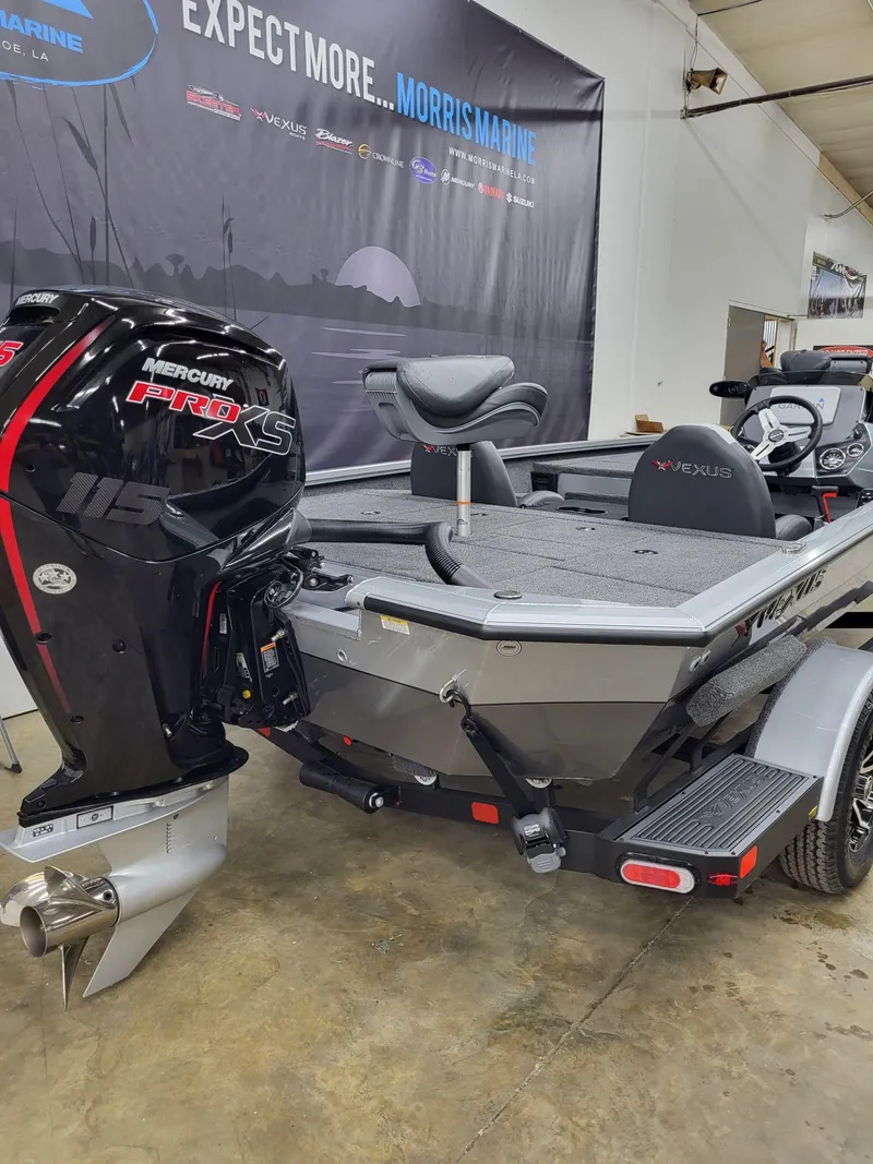 Slide: The Image of 2023 Vexus AVX1880 boat with Mercury Pro XS engine in showroom. - 7