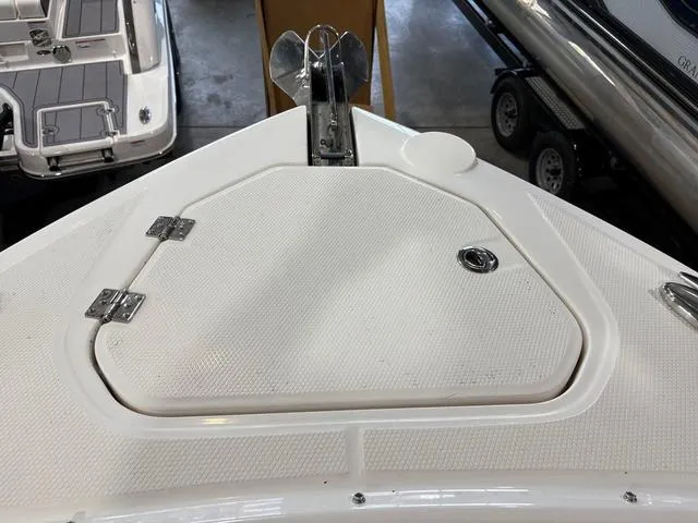 Slide: The Image of Bow of 2021 Chaparral 347 SSX boat with anchor storage compartment. - 24