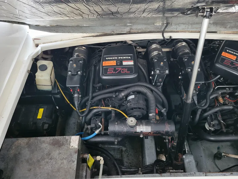 Slide: The Image of Engine compartment of a 1997 Larson 290 Cabrio with Volvo Penta 5.7L engines. - 42