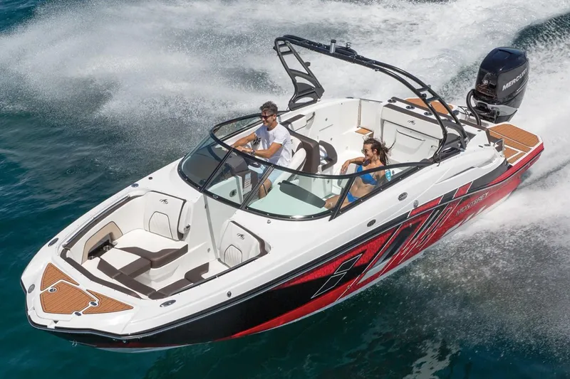 Slide: The Image of Top view of 2018 Monterey M-65 boat layout, featuring seating and steering areas. - 45