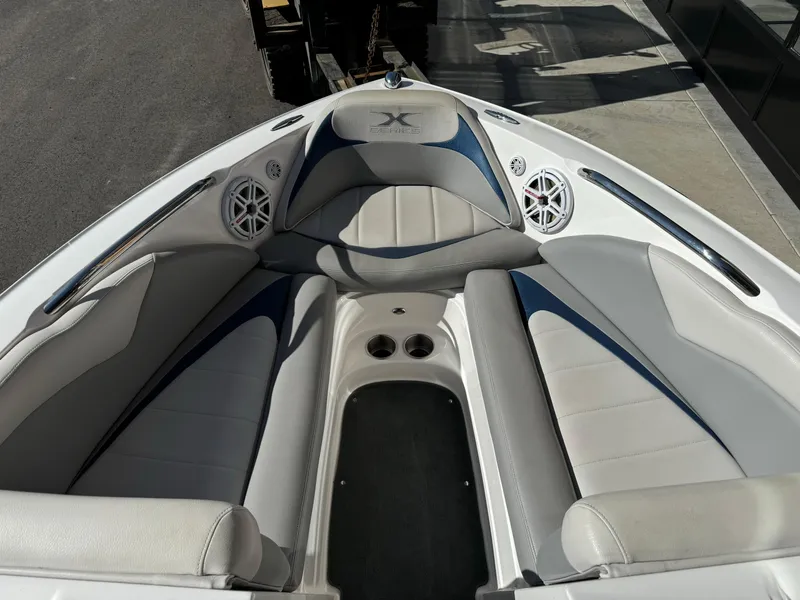 Slide: The Image of 2008 MasterCraft X-15 boat interior with cushioned seating and speakers. - 4