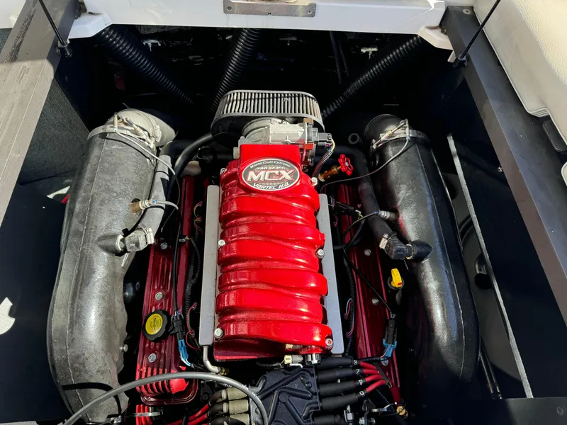 Slide: The Image of 2008 MasterCraft X-15 engine compartment with red MCX Vortec engine. - 7