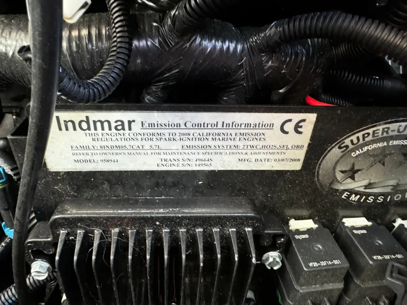 Slide: The Image of Indmar engine emission control label on a 2008 MasterCraft X-15 boat. - 8
