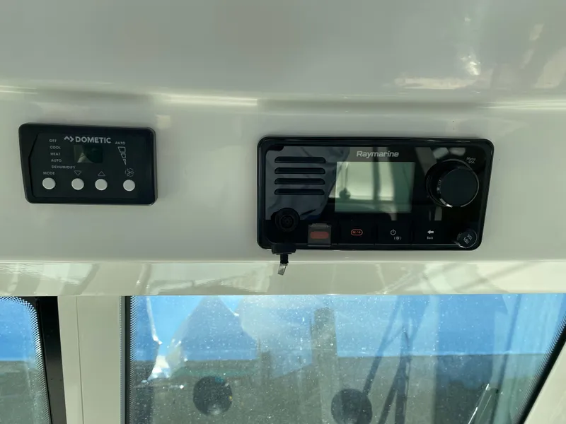 Slide: The Image of Control panel of a 2020 Boston Whaler 345 Conquest boat. - 12