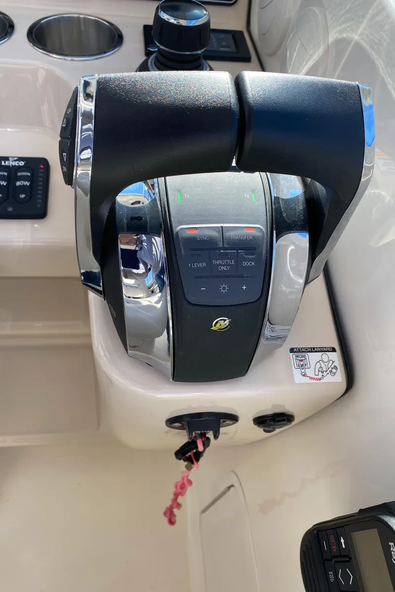 Slide: The Image of Throttle controls on 2020 Boston Whaler 345 Conquest boat dashboard. - 16