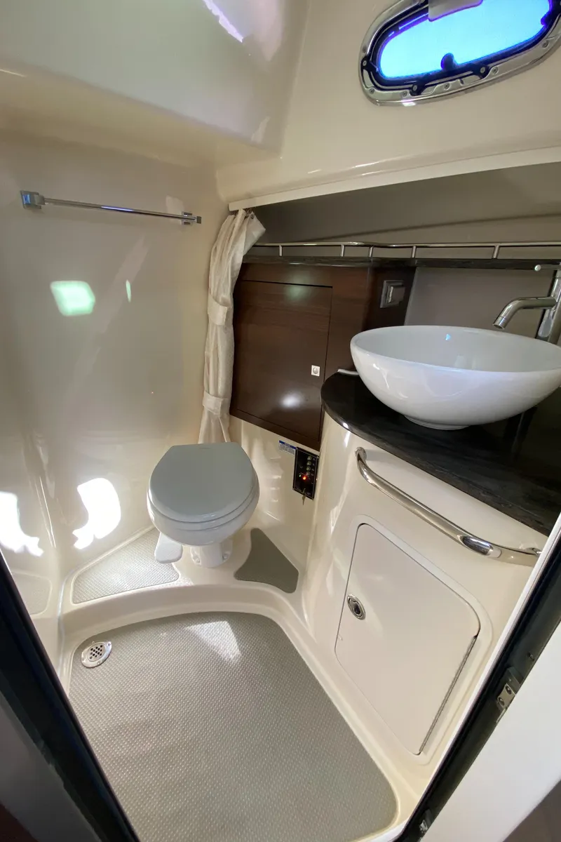 Slide: The Image of 2020 Boston Whaler 345 Conquest bathroom with modern sink and toilet. - 24