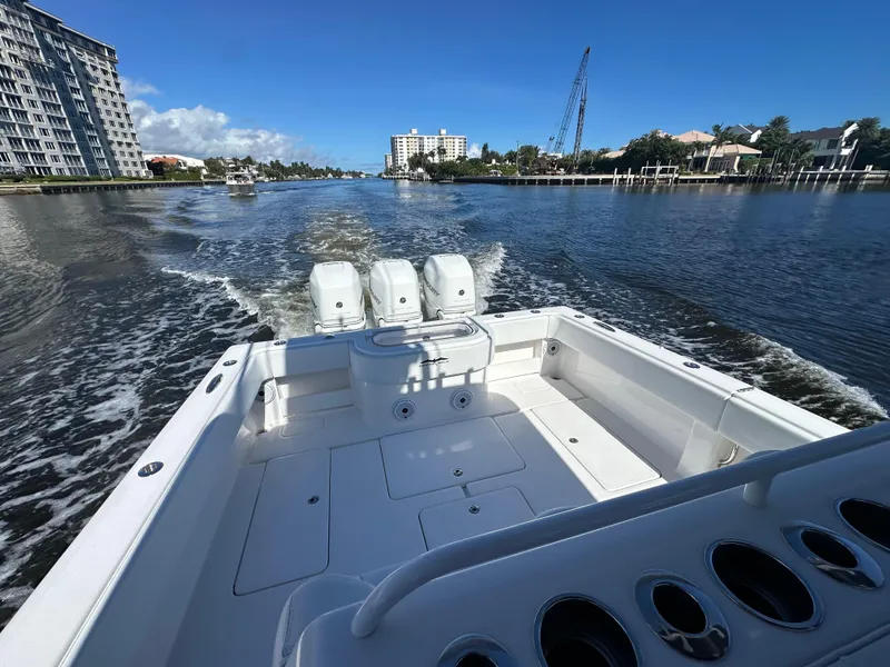 Slide: The Image of 2020 Invincible 39 Open Fisherman cruising on a sunny waterway. - 16