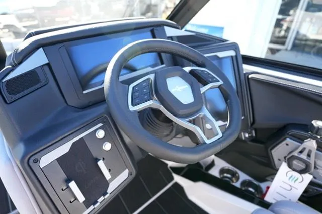 Slide: The Image of 2025 Supra SV 400 dashboard with modern steering wheel and digital display. - 12