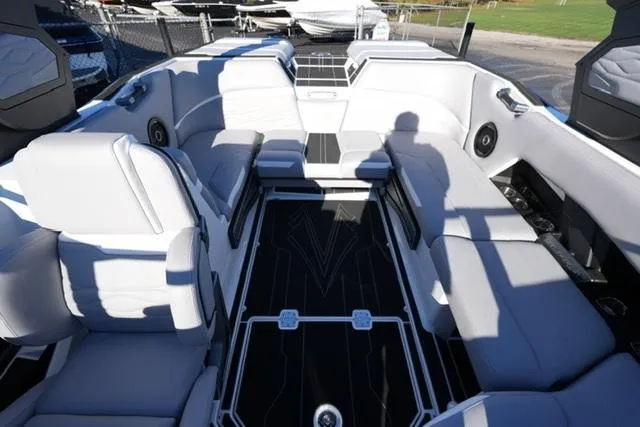 Slide: The Image of 2025 Supra SV 400 boat interior with luxurious seating and modern design. - 13