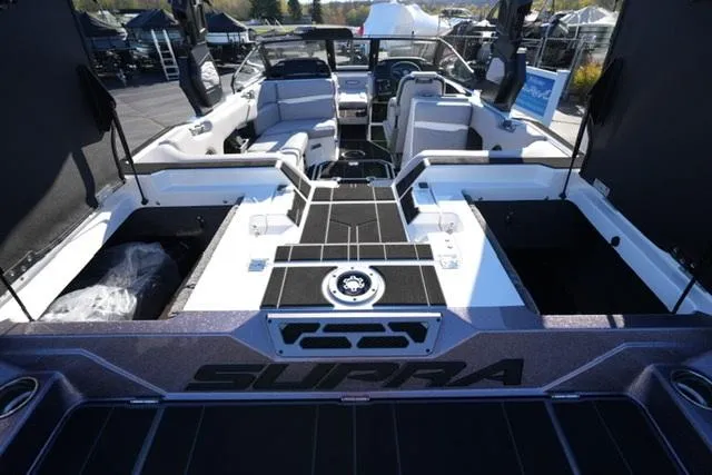 Slide: The Image of 2025 Supra SV 400 boat interior with sleek seating and modern design. - 15