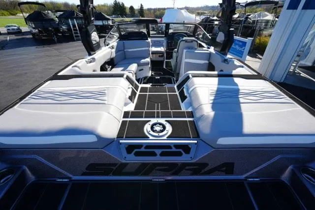 Slide: The Image of 2025 Supra SV 400 boat interior with luxurious seating and modern design. - 16