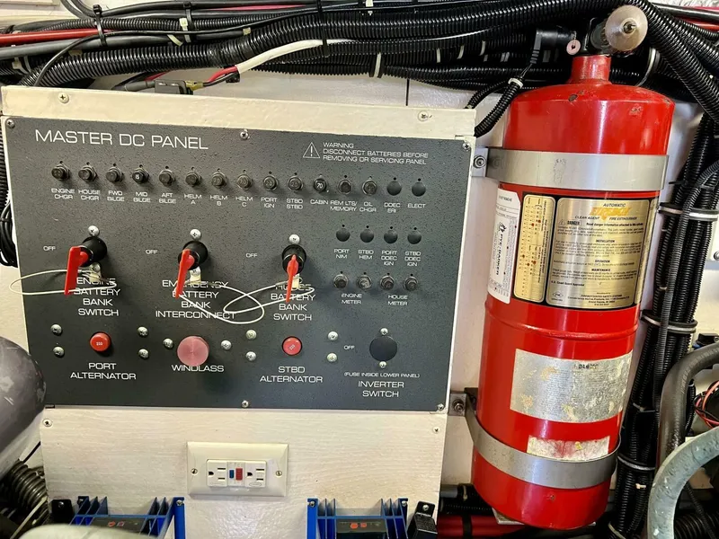 Slide: The Image of Master DC panel and fire extinguisher on 1997 Tiara Yachts 41 model. - 26
