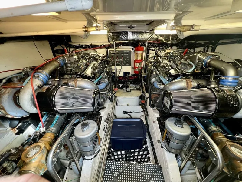 Slide: The Image of Engine room of 1997 Tiara Yachts 41, showcasing dual engines and equipment. - 29