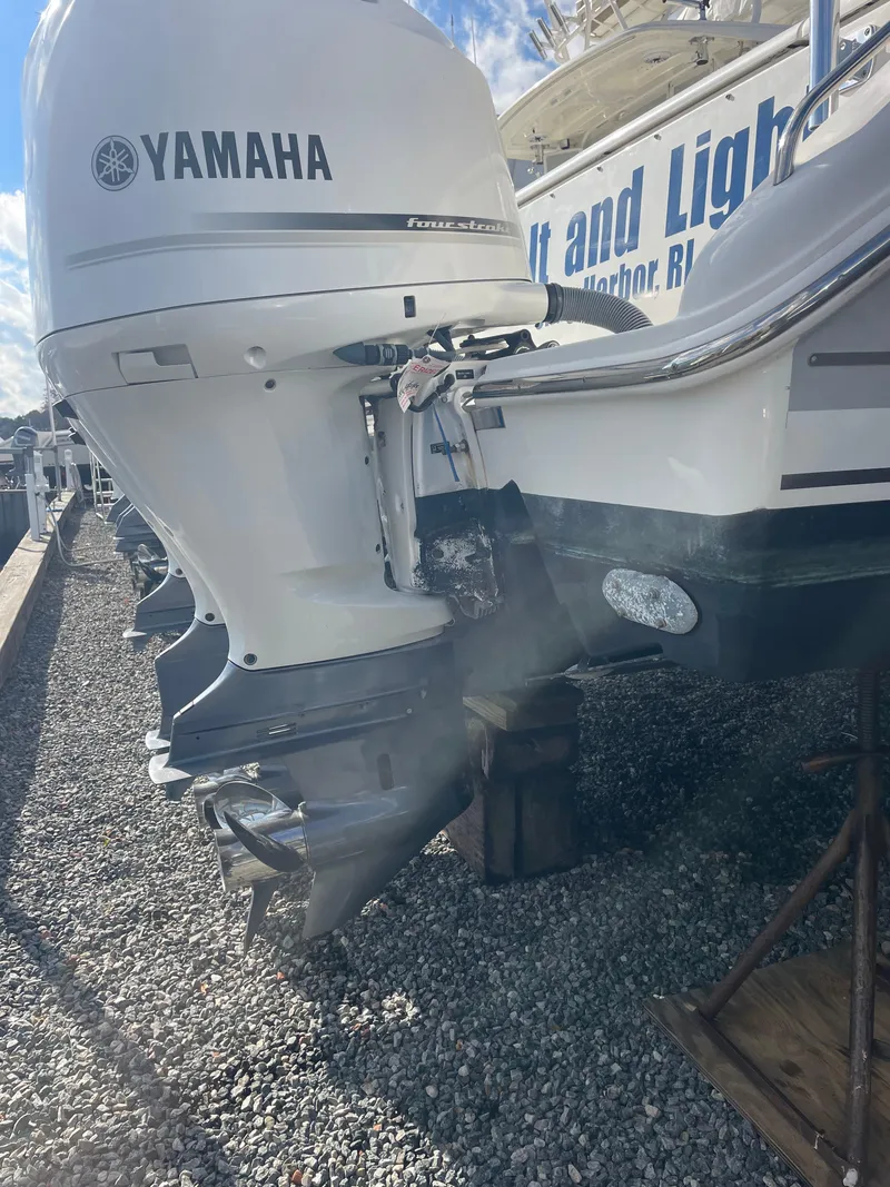Slide: The Image of 2020 Pursuit 385 Offshore boat with Yamaha outboard motor on gravel. - 19