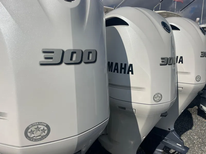 Slide: The Image of Yamaha 300 outboard engines on a 2020 Pursuit 385 Offshore boat. - 7
