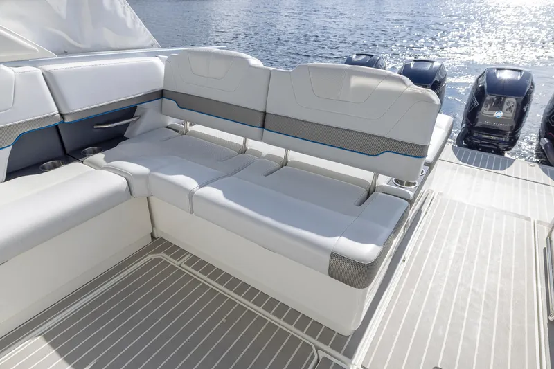 Slide: The Image of 2019 Formula 430 Super Sport Crossover boat seating area with outboard motors. - 10