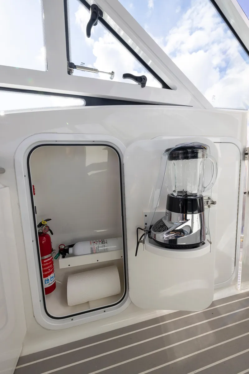 Slide: The Image of 2019 Formula 430 Super Sport Crossover interior with fire extinguisher and blender. - 20