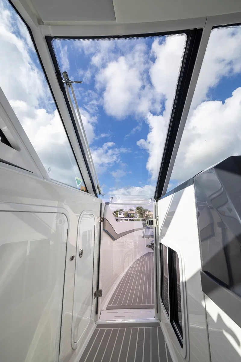 Slide: The Image of 2019 Formula 430 Super Sport Crossover yacht interior with skylight and deck view. - 27