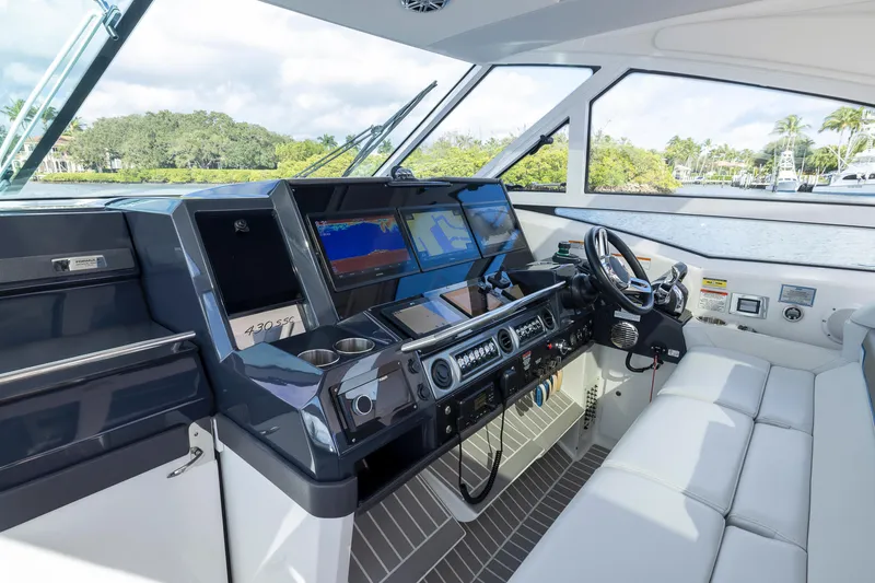 Slide: The Image of 2019 Formula 430 Super Sport Crossover helm with advanced navigation system and luxurious seating. - 32