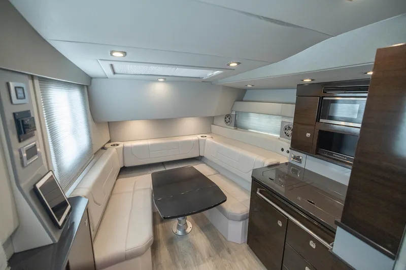 Slide: The Image of Luxurious interior of 2019 Formula 430 Super Sport Crossover yacht with modern seating and cabinetry. - 48