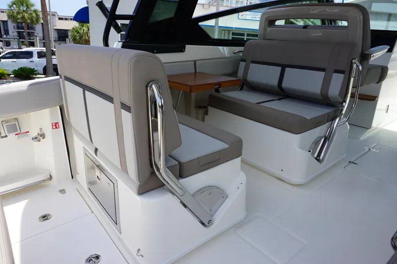 Slide: The Image of 2025 Boston Whaler 330 Vantage interior with sleek seating and modern design. - 38