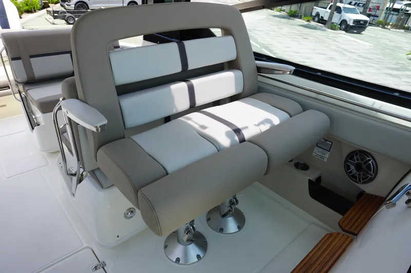Slide: The Image of 2025 Boston Whaler 330 Vantage interior seating with modern design and comfort features. - 45